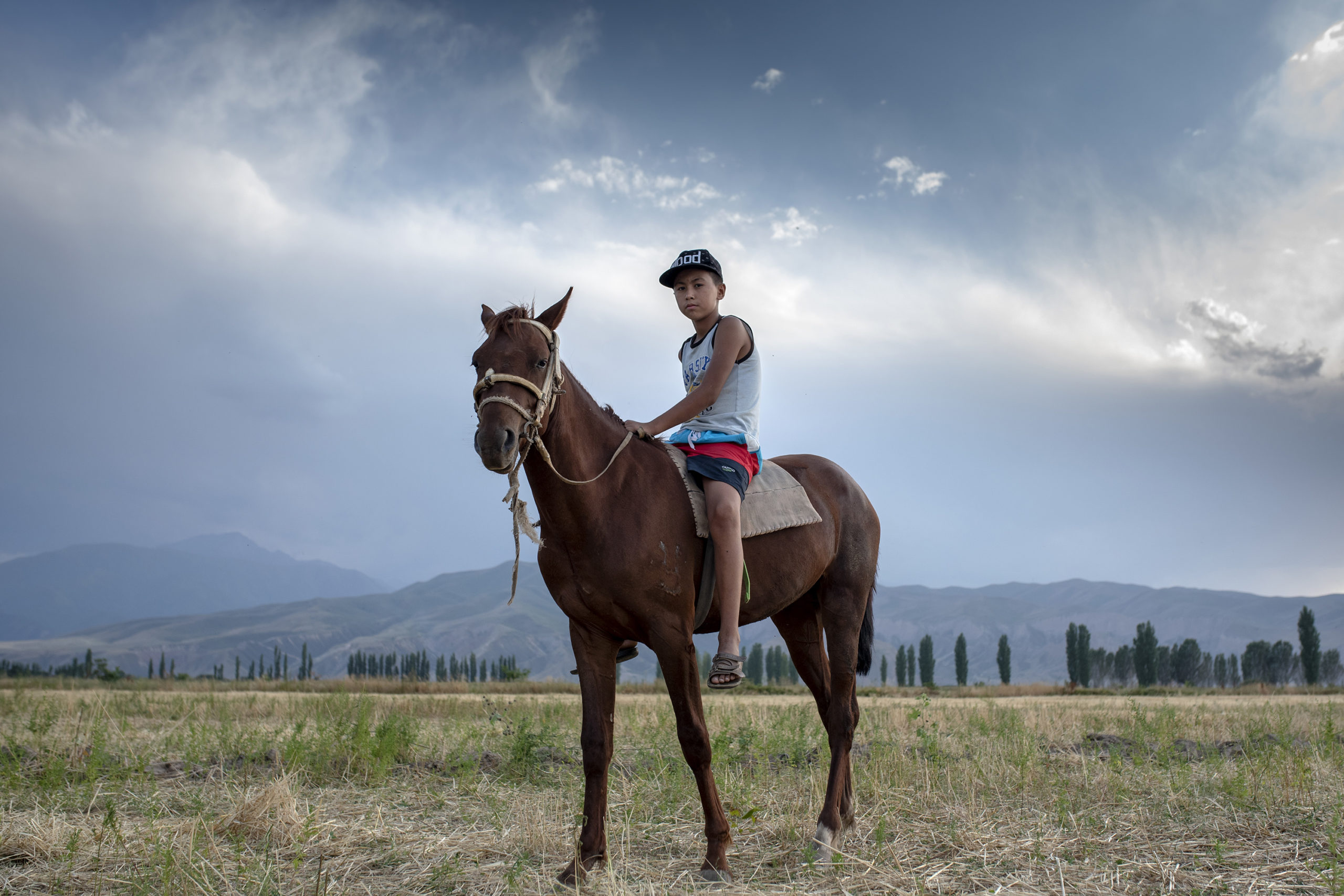 Bild des Tages Kirgistan Dorf Pferd Portrait