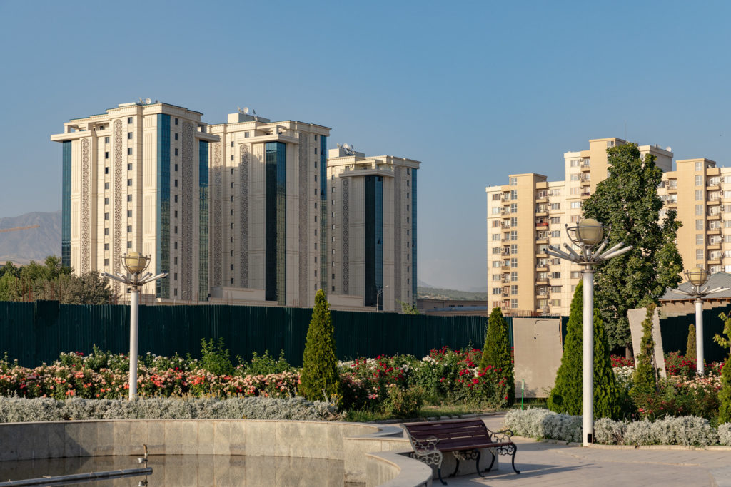 Modern buildings in Dushanbe, Tajikistan, seen from a park