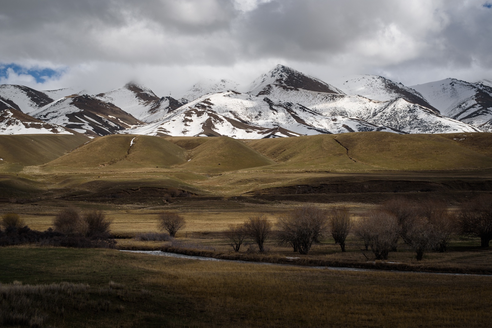 spring kyrgyzstan snow mountains