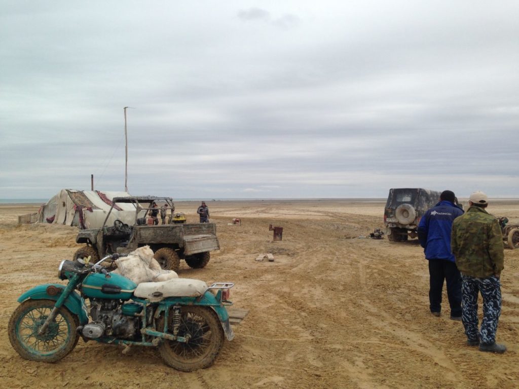 Landscape and fisherman near the Aral Sea.