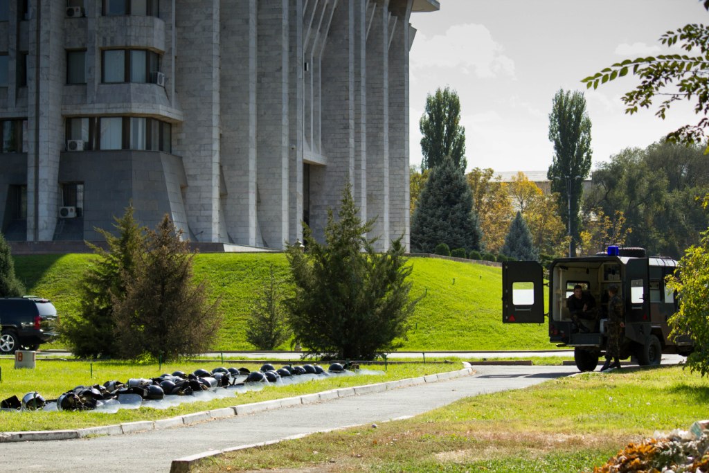 The parliament and presidential building in Kyrgyzstan. On the right, an anti-riot vehicle. 2012.