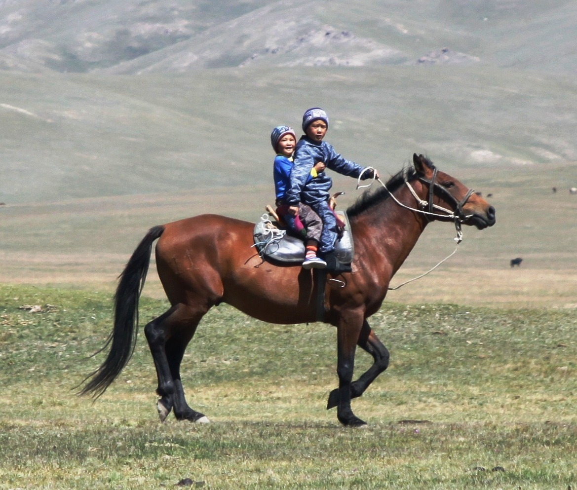 Kyrgyzstan Issyk-Koul Lake siblings horse