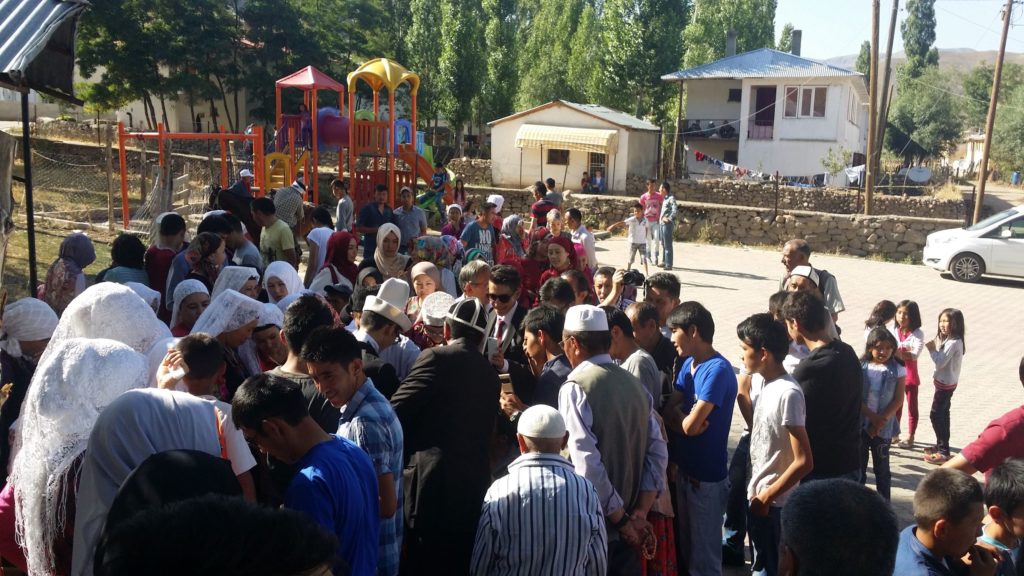 The Ulupamir community gathers for a celebration.