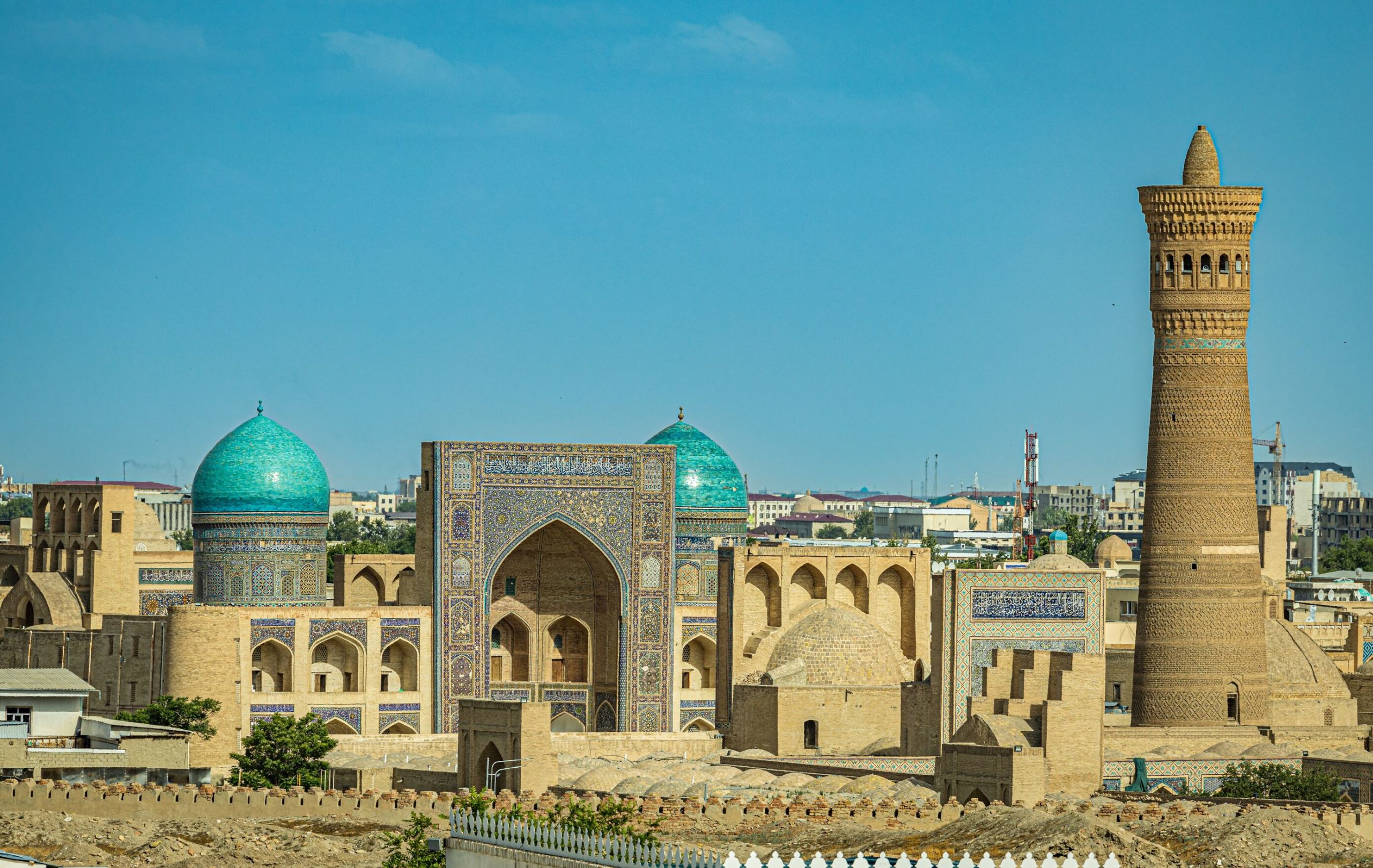 The skyline of the old city of Bukhara, Uzbekistan. Photo by Sultonbek Ikromov, Unsplash.