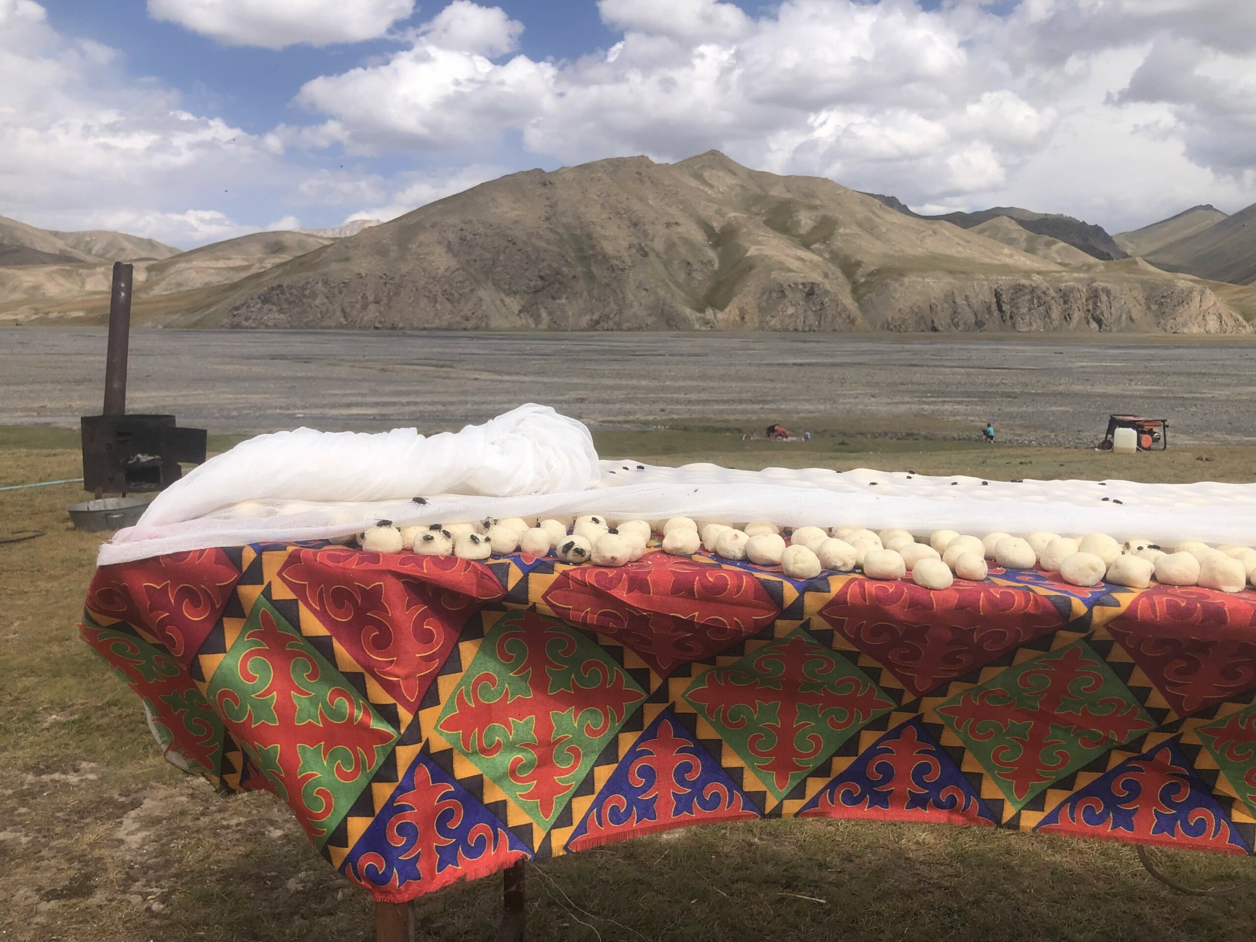 balls of cheese drying in a yurt camp