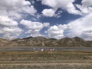 mountains laundry clouds