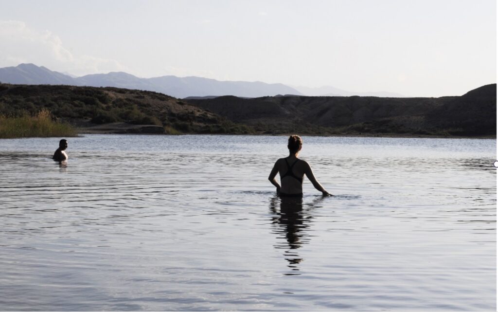 a woman bathing in Lake Tuzkel, Kyrgyzstan