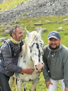 Munarbek Kuldanbaev, founder of the Chaar Appaloosa Foundation, with Nicolas Poirier, President of Chaar Appaloosa association (France), and a Chaar horse in Kyrgyzstan. Credit: Chaar Appaloosa Foundation.