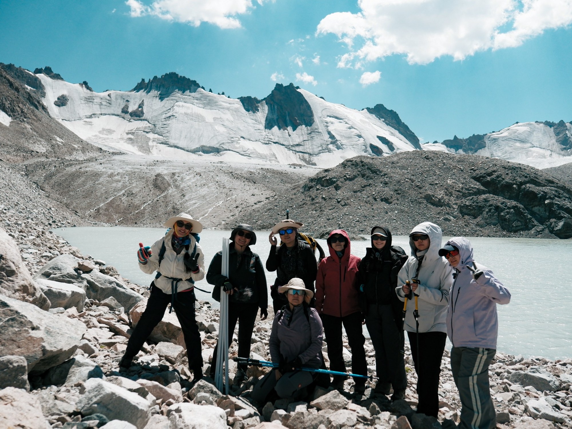 Participants in the Ala-Archa expedition in front of the glacier. Photo by Aidan Turumbekova.