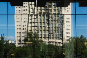 buildings mirror glass reflection trees almaty